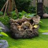 Outdoor modern tree trunk water fountain with LED lights and pump for patio, yard, porch, and pool décor.