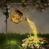 Outdoor solar watering can light, retro metal lantern with hanging LED string lights, waterproof garden decorative solar-powered yard décor.