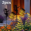 Outdoor solar watering can light, retro metal lantern with hanging LED string lights, waterproof garden decorative solar-powered yard décor.