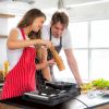 Portable dual burner electric stove with 2000W power, 5 heat levels, fast even cooking, and compact design for apartments, RVs, and patios.